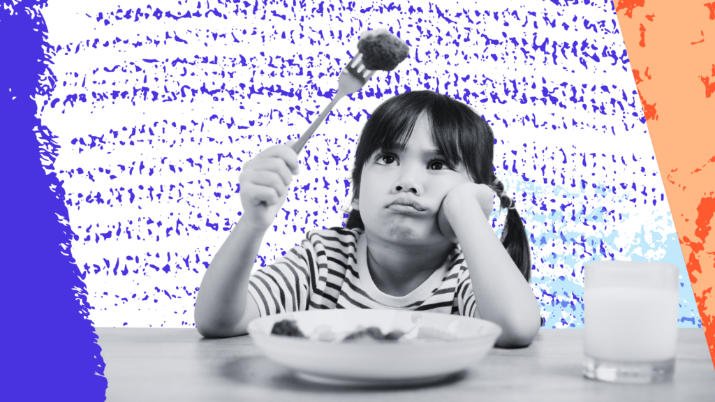 Child staring at a meatball on a fork