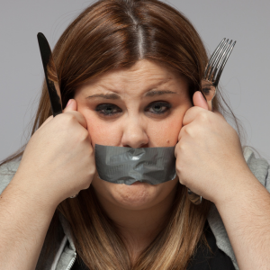 Child with mouth duct taped shut