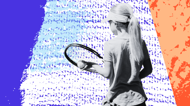 Child playing tennis