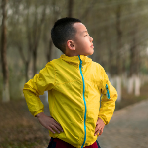 Child posing in an athletic jacket