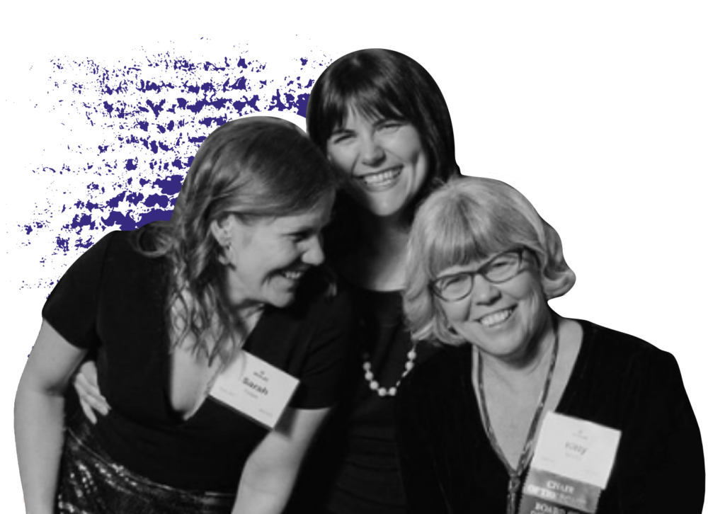 Three people smiling