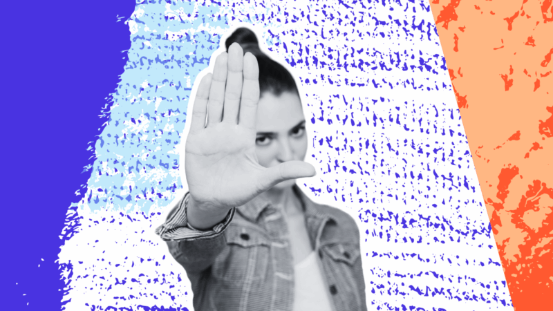 Woman holding out hand to stop