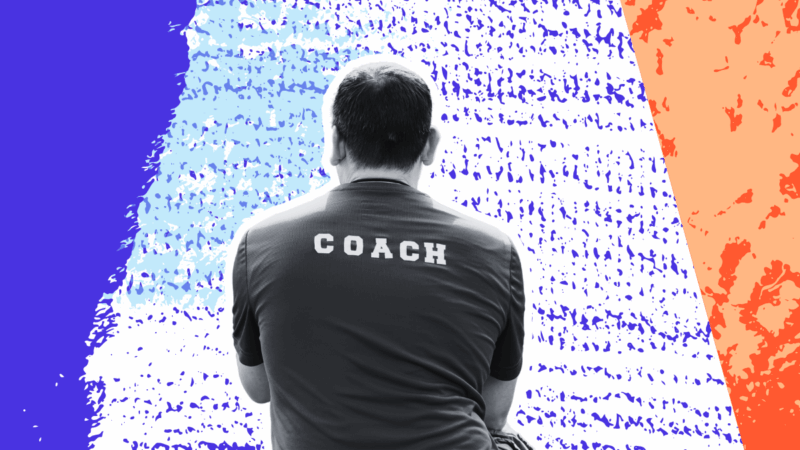 Man with coach shirt standing