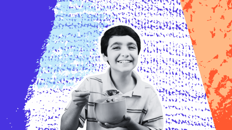 smiling boy eating healthy